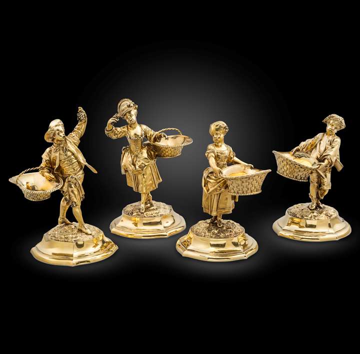 A Set of Four Victorian Silver-Gilt Figural Salts 